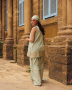 Side view of the Honeydew Frost kurta and farshi shalwar