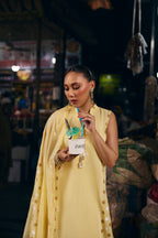 Model in the Lemon Meringue long yellow kurta with gold polka dots